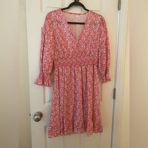 Pink floral dress.